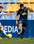 Mizzian durante un partido con la camiseta del UCAM Murcia CF
