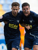 Celebración de Sergi Baldrich y Aquino en el estadio Heredia 21 La Condomina
